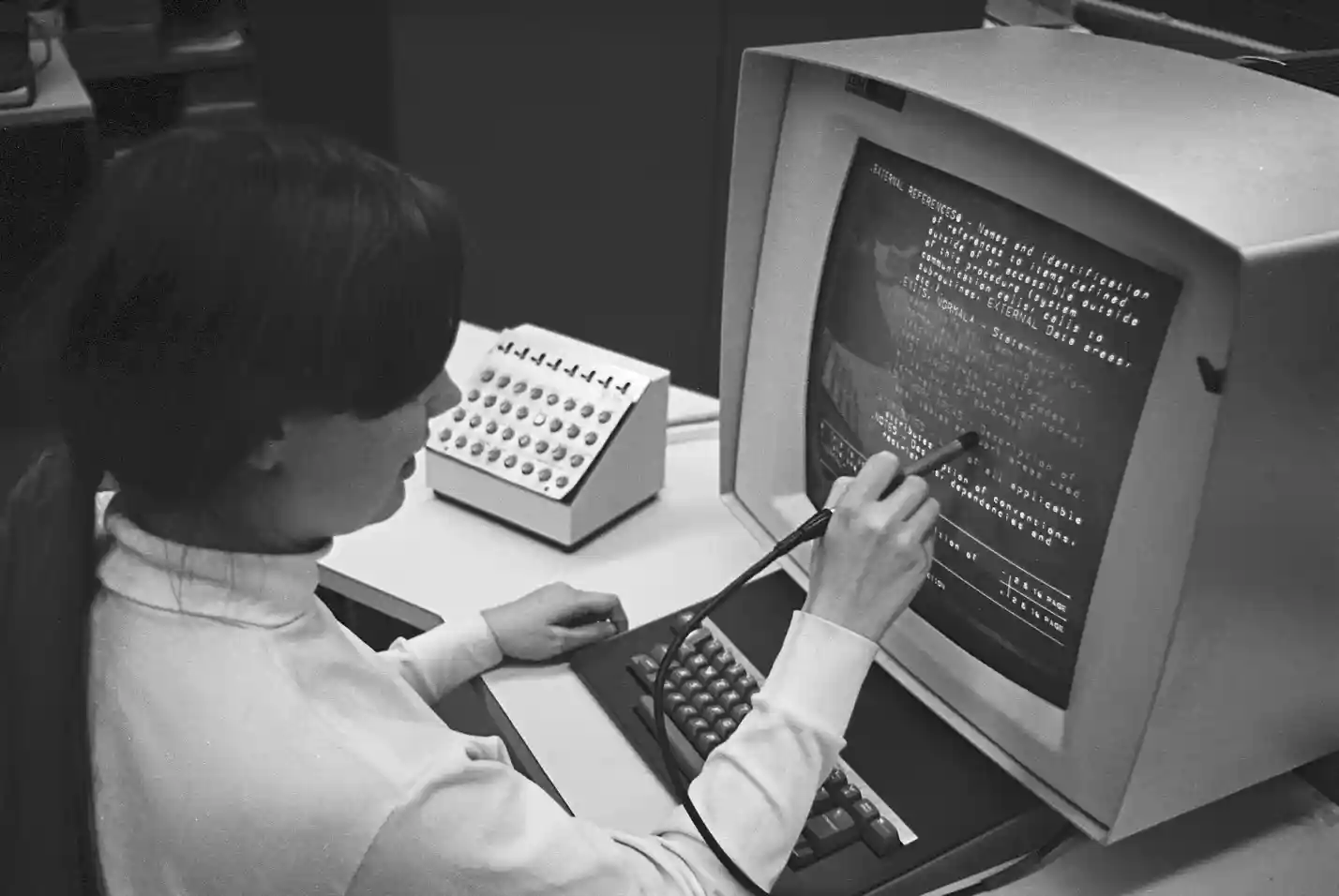 Figure 1: A computer operator using the Hypertext Editing System in 1969. (Gregory Lloyd from Wikipedia, CC BY-SA 4.0 International.)