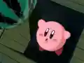 Kirby falls into a trap door after being lured to the laboratory.