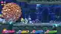Kirby's team runs from a menacing ball of Waddle Dees.