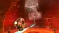 Kirby riding a rail in the volcano segment