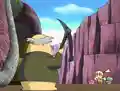 Curio attacking Dedede Stone with his pickaxe