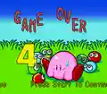 Kirby looking distressed on the Game Over screen of Kirby's Avalanche.