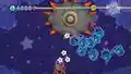 Kirby battling Space Kracko in Outer Rings