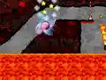 The lava strikes back as it rises quickly in an attempt to catch Kirby.