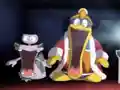 King Dedede and Escargoon are shocked to the core over the cartoon.