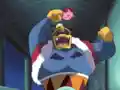 A now normal Kirby as he is beat upon by Devil King Dedede