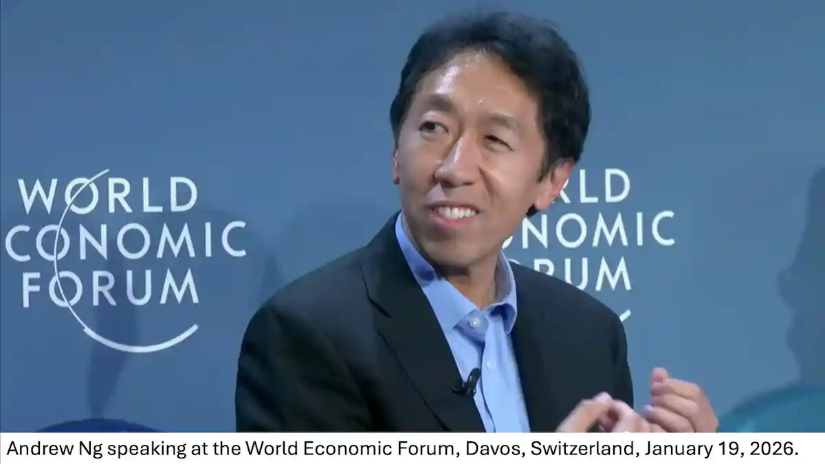 Close-up of Andrew Ng speaking at World Economic Forum, backdrop reads "World Economic Forum" in white text.