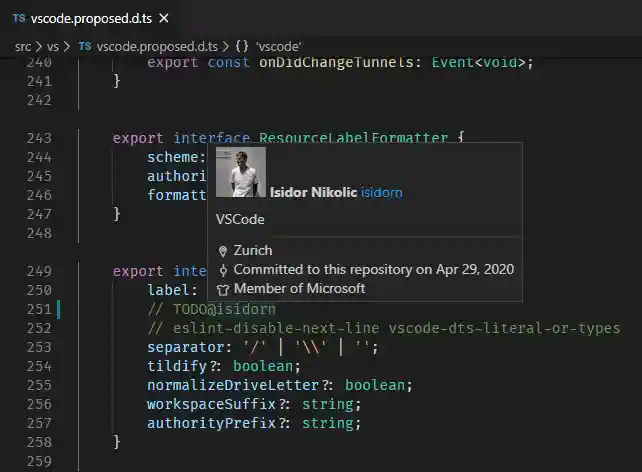 Screenshot showing a user hover for a @-mentioned user in a code comment.