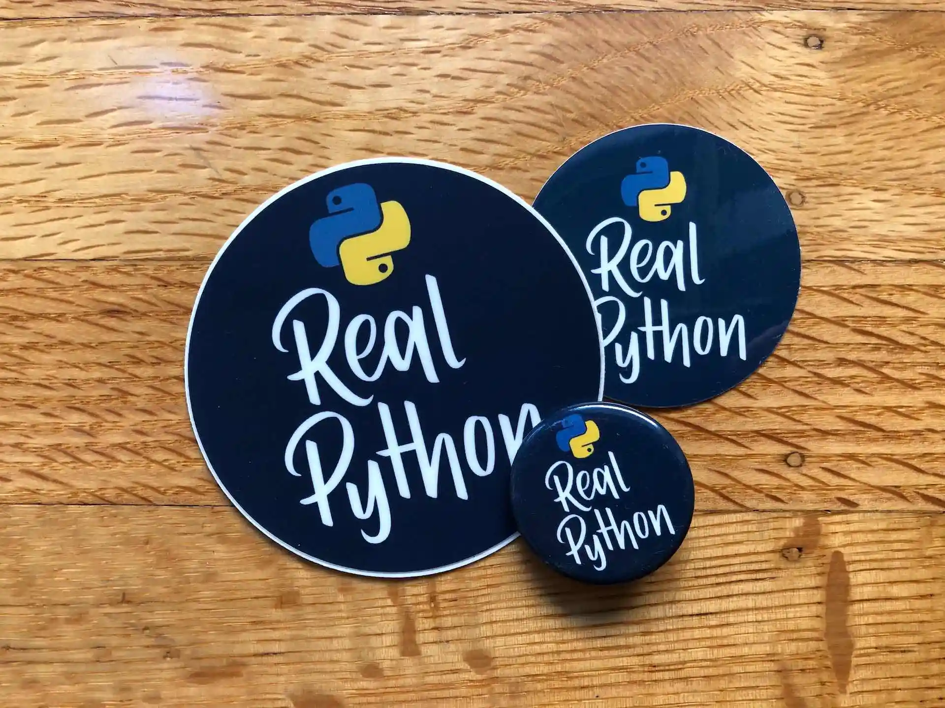 Real Python Swag: Stickers and a Pin