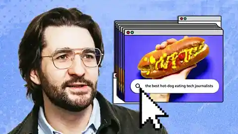 The writer looking at browser windows with an image of a hot dog, and the words 'the best hot-dog-eating tech journalists' in a search bar (Credit: Serenity Strull/ Madeleine Jett)