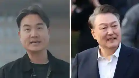 On the left of the image is a man in a black jacket. On the right, a man with greying hair wears a dark jacket and a white shirt.