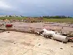 EF5 damage example -- Well-built house is swept completely away, leaving only the slab foundation