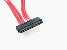Four red cables lead into a wide black electrical connector