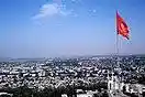 Osh, Kyrgyz flag. Sept 2002 (3507795981).jpg