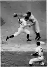 first base - the base that must be touched first by a base runner in baseball