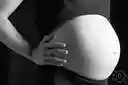 heavy - in an advanced stage of pregnancy