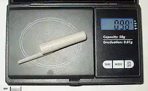 Gram (pen cap on scale).jpg
