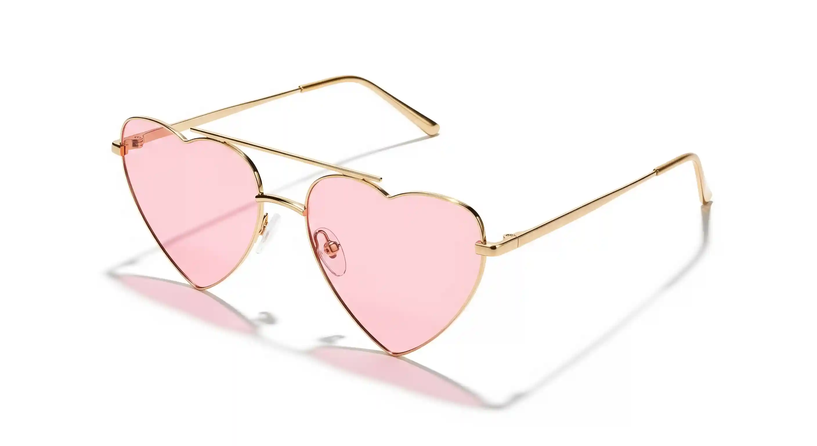 Whimsical pink, heart-shaped sunglasses