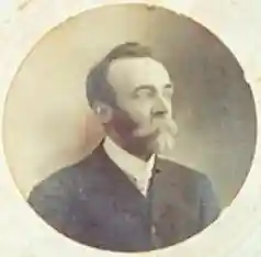 round sepia toned image of William Evenden