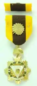 Regalia of a KOR is a ribbon with a golden anahaw rosette