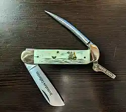 Slip joint knife with marlinspike