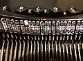 Typebars in a 1920s typewriter
