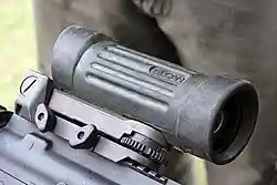 Close-up of adjustment controls on a C79 3.4×28 optical sight.