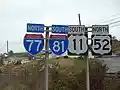 This westbound highway in southwestern Virginia simultaneously carries I-77 and I-81 in opposite directions. The wrong-way concurrency is also reflected in US 52 and US 11, which are concurrent with I-77 and I-81, respectively.