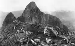 Machu Picchu citadel on a ridge with Huayna Picchu rising behind