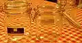 Flip-top or bail closure on storage jar
