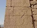 A wall relief of Horemheb making an offering to Amun on the 10th pylon at Karnak