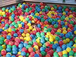 Ball pit of the type provided for children's entertainment in shopping malls