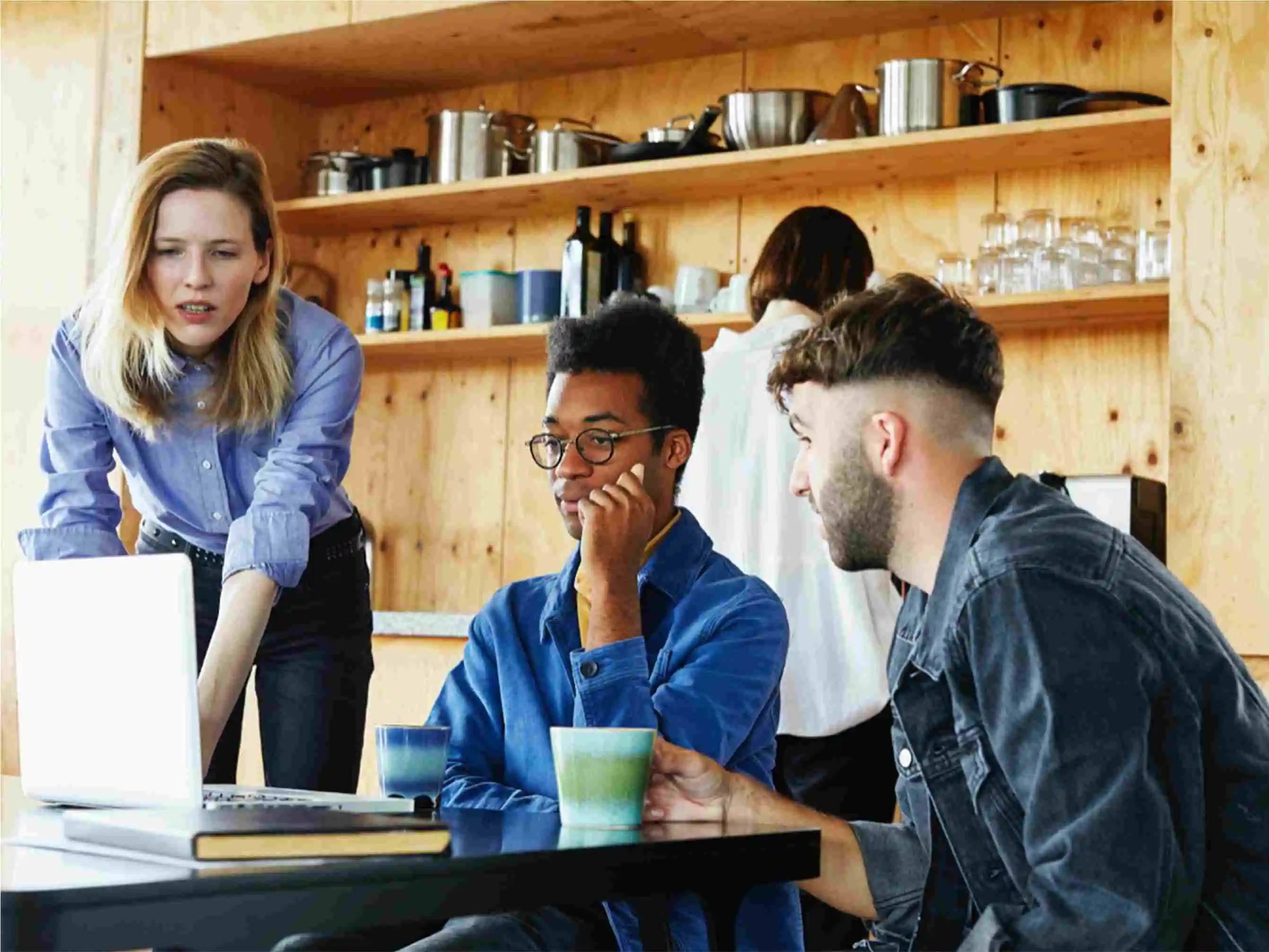 Developers looking at laptop